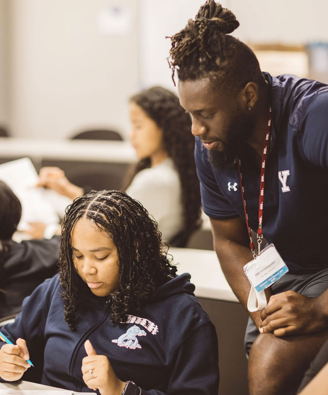 Angel Lewis works with Yale tutor Oso Ifesinachukwu at GTP Summer Program.